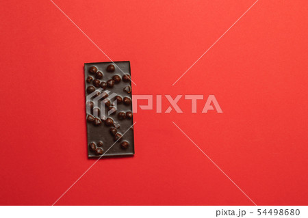 Chocolate pieces. Chopped dark chocolate closeup Chocolate pieces. Chopped dark chocolate closeup 54498680