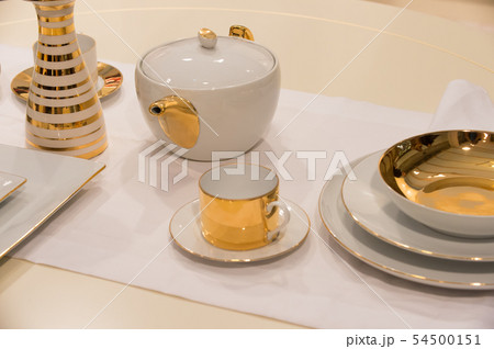 Tea service or set with pot, cup, saucer, plates 54500151