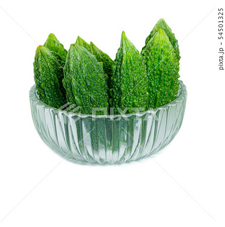 Bitter gourd pile in clear Glass bowl on white Bitter gourd pile in clear Glass bowl on white 54501325