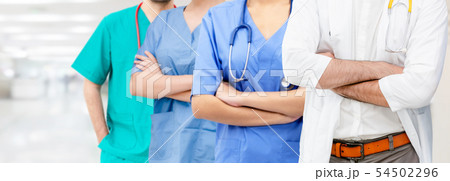 Doctor working in hospital with other doctors. Doctor working in hospital with other doctors. 54502296