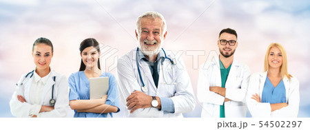 Doctor working in hospital with other doctors. Doctor working in hospital with other doctors. 54502297