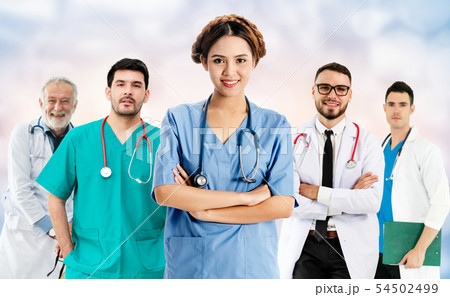 Doctor working in hospital with other doctors. Doctor working in hospital with other doctors. 54502499
