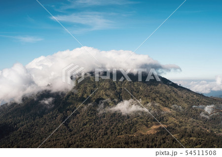 Clouds covered on peak volcano in the morning Clouds covered on peak volcano in the morning 54511508