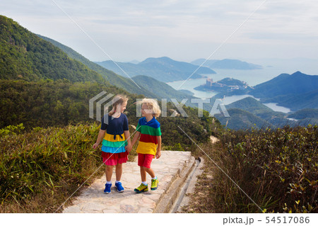 Family hiking in Hong Kong mountains Family hiking in Hong Kong mountains 54517086