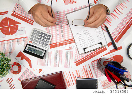 Directly above view of businessman working and Directly above view of businessman working and 54518595