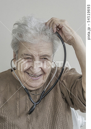 senior woman with stethoscope senior woman with stethoscope 54519693
