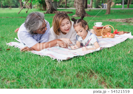 Asian grandparents and granddaughter 54521559