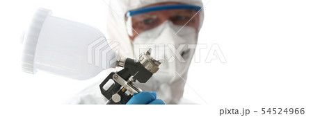 Workman hold in arm airbrush gun wearing protective suit Workman hold in arm airbrush gun wearing protective suit 54524966