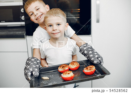Little girl cook the dough for cookies 54528562
