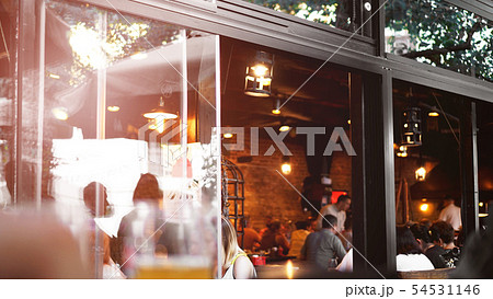 Closeup of European cafe. Outdoor restaurant in summer evening in Lviv, Ukraine Closeup of European cafe. Outdoor restaurant in summer evening in Lviv, Ukraine 54531146
