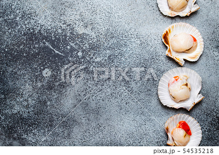 Raw fresh uncooked scallops 54535218