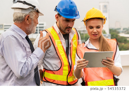 Engineer, architect and business man working. 54535372