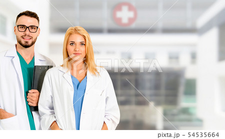 Doctors working with colleague in the hospital. Doctors working with colleague in the hospital. 54535664