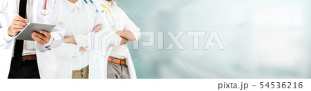 Doctor working in hospital with other doctors. 54536216