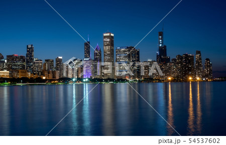 The citylights of Chicago Skyline in the evening - CHICAGO, USA - JUNE 12, 2019 The citylights of Chicago Skyline in the evening - CHICAGO, USA - JUNE 12, 2019 54537602
