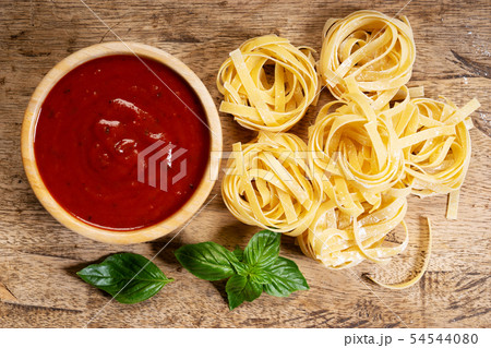 Dried pasta fettuccine with ingredients Dried pasta fettuccine with ingredients 54544080