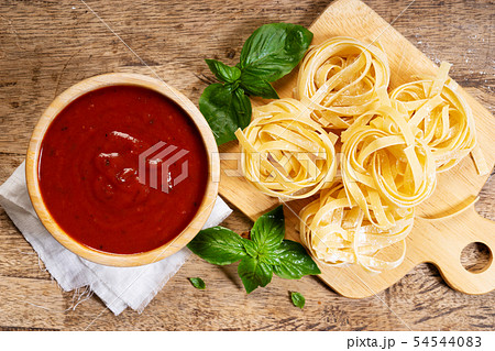Dried pasta fettuccine with ingredients Dried pasta fettuccine with ingredients 54544083
