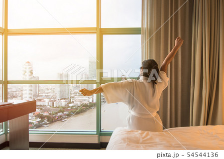 Easy lifestyle Asian woman waking up in weekend 54544136