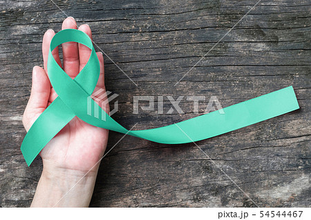 Mint green ribbon awareness for Genetic Disorder 54544467