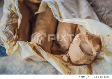 Close up of brown pottery clay for modeling Close up of brown pottery clay for modeling 54546386