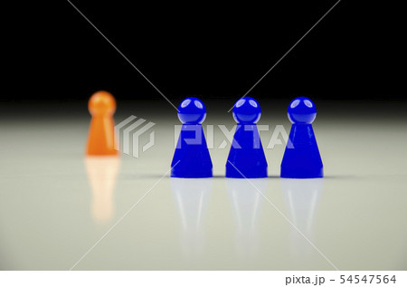 Close-up view of a row of blue figures with one 54547564