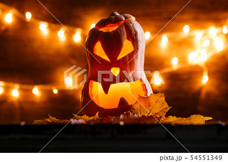 Photo of halloween pumpkin cut in shape of face 54551349