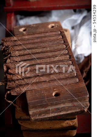 Cigar rolling or making by torcedor in cuba Cigar rolling or making by torcedor in cuba 54554299