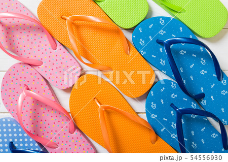 a lot of flip flop colored sandals, summer 54556930