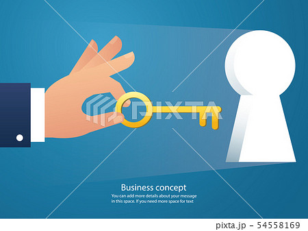 hand holding the big key into keyhole 54558169
