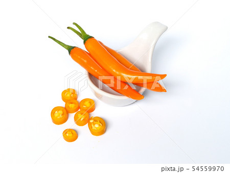 Closeup top, sliced orange pepper on a white BG 54559970