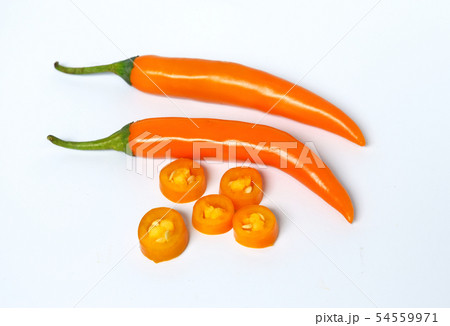 Closeup top, sliced orange pepper on a white BG Closeup top, sliced orange pepper on a white BG 54559971