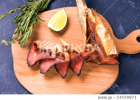 Pieces Of Cold Smoked Pink Salmon. Close-Up on the table Pieces Of Cold Smoked Pink Salmon. Close-Up on the table 54559973