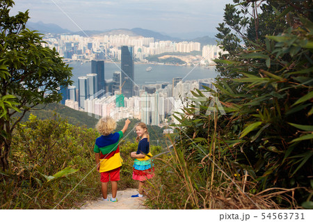 Family hiking in Hong Kong mountains 54563731