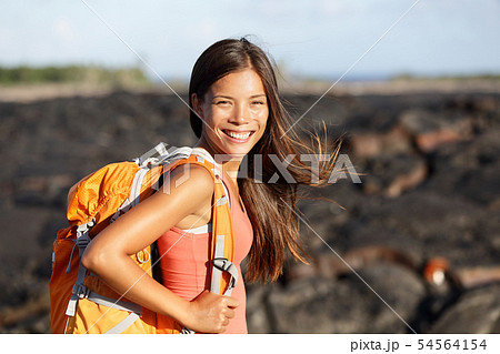 Hiking woman - hiker walking on lava field Hawaii 54564154