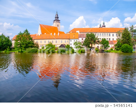 Panoramic view of Telc Castle. Water reflection, Czech Republic. UNESCO World Heritage Site. Panoramic view of Telc Castle. Water reflection, Czech Republic. UNESCO World Heritage Site. 54565141