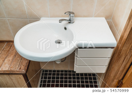 The photo of a sink in a bathroom The photo of a sink in a bathroom 54570999
