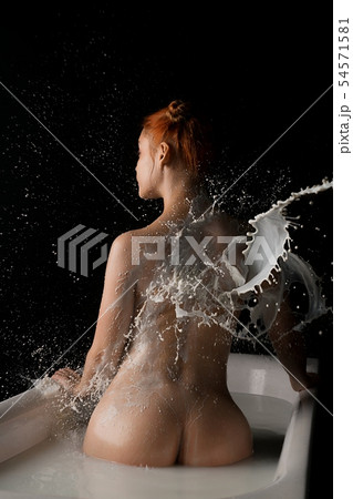 Girl in the nude having bath rearview Girl in the nude having bath rearview 54571581