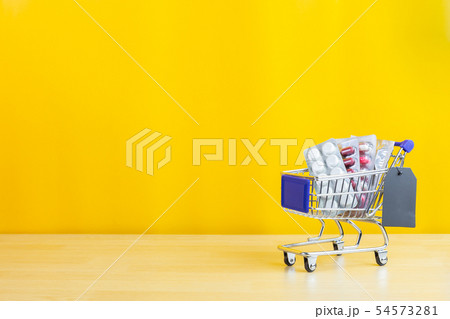 pills and drugs on shopping cart pills and drugs on shopping cart 54573281