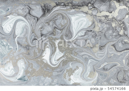 Marbling pattern. Golden powder marble liquid texture. Marbling pattern. Golden powder marble liquid texture. 54574166