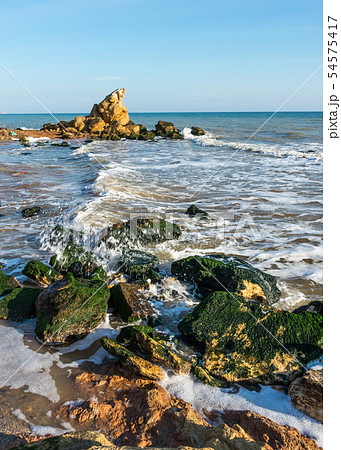 Stones at the edge of the sea 54575417