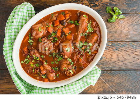 Coq au Vin, traditional French recipe of chicken Coq au Vin, traditional French recipe of chicken 54579438