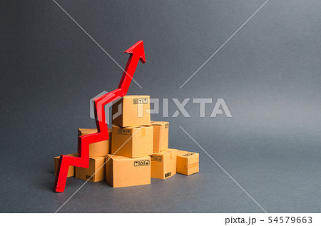 A pile of cardboard boxes and a red up arrow 54579663