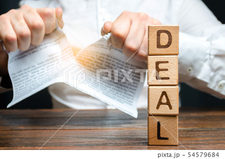 The word deal and businessman is breaking  54579684