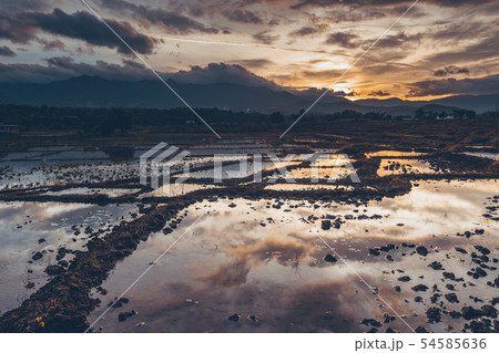 Mountain and village views and fields in the rainy Mountain and village views and fields in the rainy 54585636