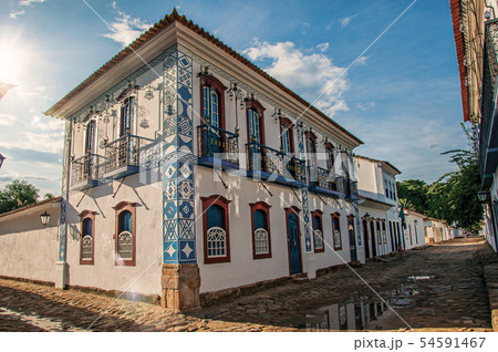 Flooded cobblestone street with old houses Flooded cobblestone street with old houses 54591467