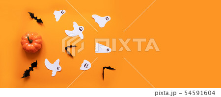 Flat lay composition of orange pumpkin, black Flat lay composition of orange pumpkin, black 54591604