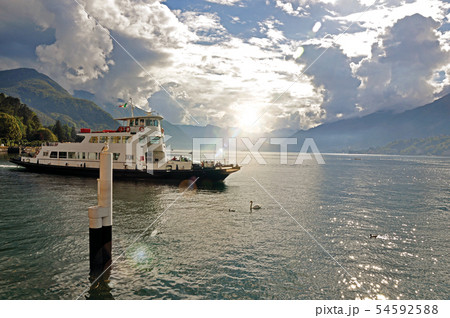 View of Lake Como in a cloudy day with boat 54592588