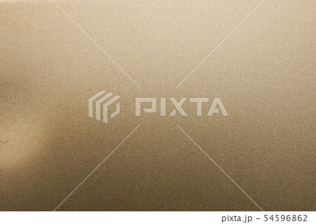 Dirty on brushed bronze metal plate, abstract 54596862