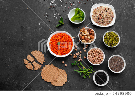 Healthy vegan food on a concrete background Healthy vegan food on a concrete background 54598900