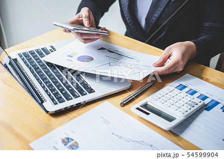 Businesswoman accountant working analyzing and 54599904